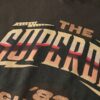 70er-Jahre-Rockband-T-Shirt mit Flügelärmeln 70er-Jahre-Rockband-T-Shirt mit Flügelärmeln