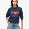 Americana-Pullover mit Rundhalsausschnitt aus Strickmode Americana-Pullover mit Rundhalsausschnitt aus Strickmode