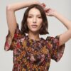 Bedrucktes, kurzärmeliges, gestuftes Midikleid Bedrucktes, kurzärmeliges, gestuftes Midikleid