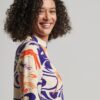 Bedrucktes Minikleid mit langen Ärmeln Bedrucktes Minikleid mit langen Ärmeln