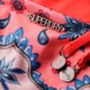 Bikini-Slip mit seitlichen Bändern Bikini-Slip mit seitlichen Bändern
