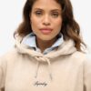 Country Club Velours-Kapuzenpullover mit lockerer Passform Country Club Velours-Kapuzenpullover mit lockerer Passform