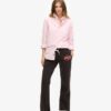 Jogginghose mit niedrigem Bund und ausgestelltem Bein sowie Neon-Vintage-Logo Jogginghose mit niedrigem Bund und ausgestelltem Bein sowie Neon-Vintage-Logo
