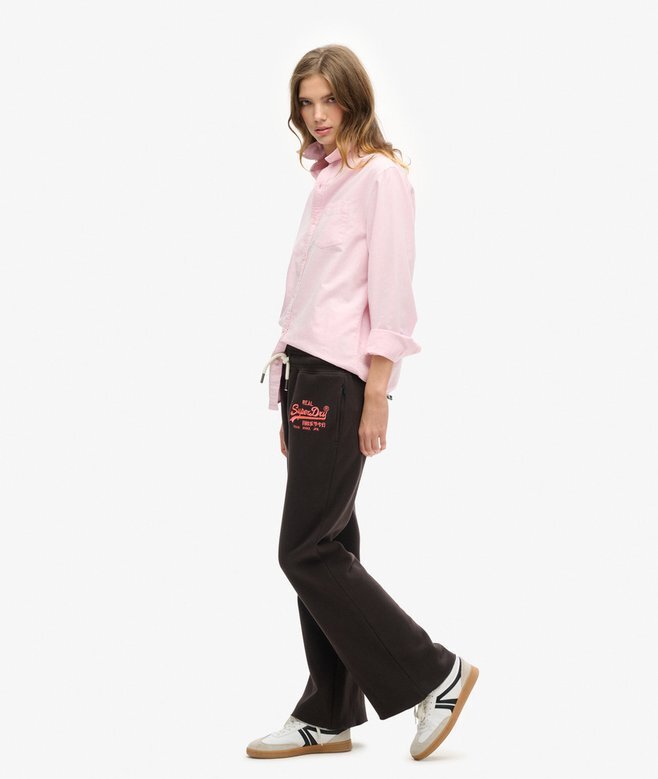 Jogginghose mit niedrigem Bund und ausgestelltem Bein sowie Neon-Vintage-Logo Jogginghose mit niedrigem Bund und ausgestelltem Bein sowie Neon-Vintage-Logo