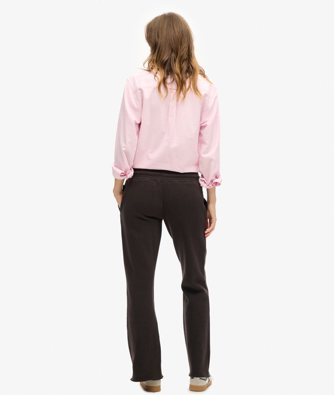 Jogginghose mit niedrigem Bund und ausgestelltem Bein sowie Neon-Vintage-Logo Jogginghose mit niedrigem Bund und ausgestelltem Bein sowie Neon-Vintage-Logo