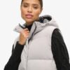 Lange, wattierte Hooded-Weste