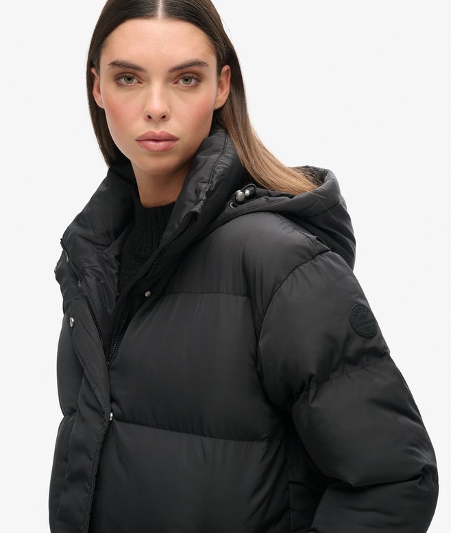 Langer Puffer-Mantel mit Kapuze Langer Puffer-Mantel mit Kapuze