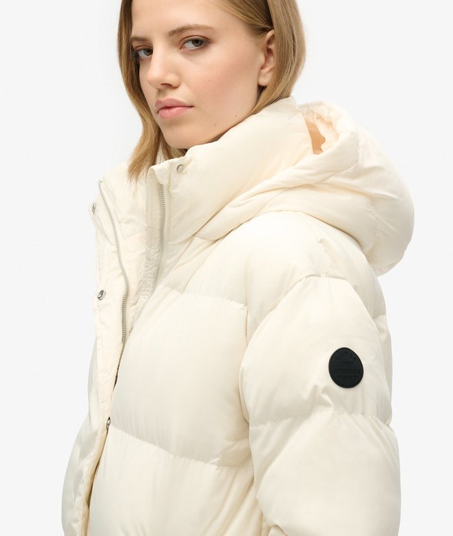 Langer Puffer-Mantel mit Kapuze Langer Puffer-Mantel mit Kapuze