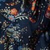Langärmliges Midi-Kleid mit Stufenrock Langärmliges Midi-Kleid mit Stufenrock