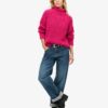 Locker sitzender Rollkragenpullover aus Strickmode Locker sitzender Rollkragenpullover aus Strickmode