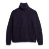 Locker sitzender Rollkragenpullover aus Strickmode Locker sitzender Rollkragenpullover aus Strickmode