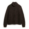Locker sitzender Rollkragenpullover aus Strickmode Locker sitzender Rollkragenpullover aus Strickmode