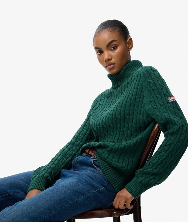 Locker sitzender Rollkragenpullover mit Zopfmuster Locker sitzender Rollkragenpullover mit Zopfmuster