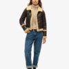 Locker sitzender Rollkragenpullover mit Zopfmuster Locker sitzender Rollkragenpullover mit Zopfmuster
