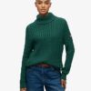 Locker sitzender Rollkragenpullover mit Zopfmuster Locker sitzender Rollkragenpullover mit Zopfmuster