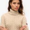 Locker sitzender Rollkragenpullover mit Zopfmuster Locker sitzender Rollkragenpullover mit Zopfmuster