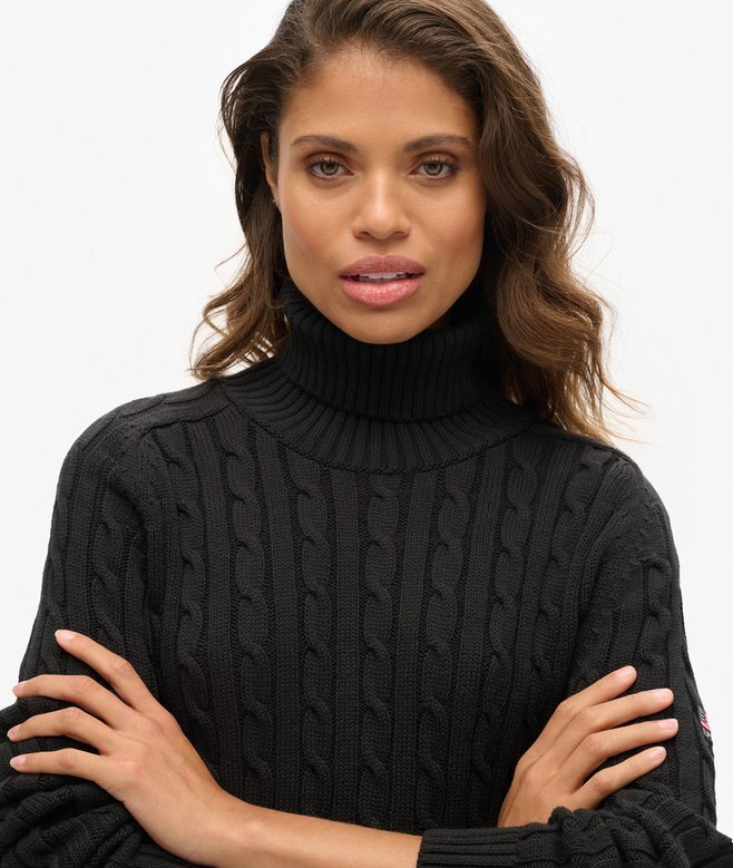 Locker sitzender Rollkragenpullover mit Zopfmuster Locker sitzender Rollkragenpullover mit Zopfmuster