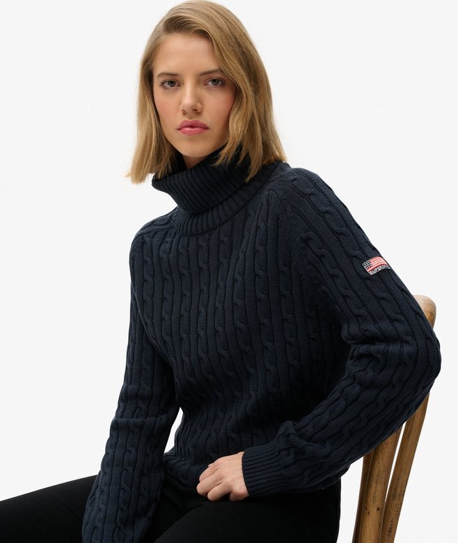 Locker sitzender Rollkragenpullover mit Zopfmuster Locker sitzender Rollkragenpullover mit Zopfmuster