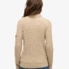 Locker sitzender Rollkragenpullover mit Zopfmuster Locker sitzender Rollkragenpullover mit Zopfmuster