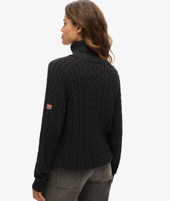 Locker sitzender Rollkragenpullover mit Zopfmuster Locker sitzender Rollkragenpullover mit Zopfmuster
