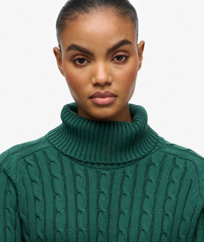 Locker sitzender Rollkragenpullover mit Zopfmuster Locker sitzender Rollkragenpullover mit Zopfmuster