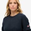 Locker sitzender Strickpullover mit Rundhalsausschnitt Locker sitzender Strickpullover mit Rundhalsausschnitt
