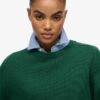 Locker sitzender Strickpullover mit Rundhalsausschnitt Locker sitzender Strickpullover mit Rundhalsausschnitt