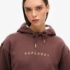 Luxe Metallic Logo Kapuzenpullover-Kleid Luxe Metallic Logo Kapuzenpullover-Kleid