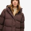 Maxi-Puffer-Mantel mit Kapuze Maxi-Puffer-Mantel mit Kapuze