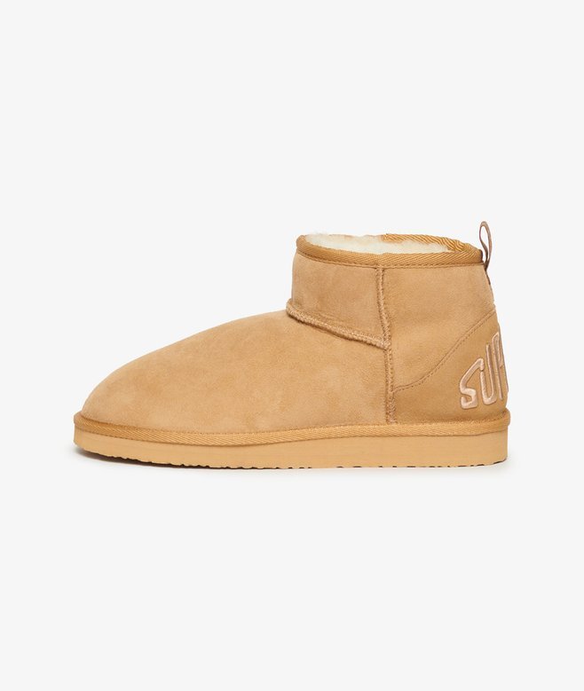 Mini-Stiefel aus Wildleder und Sherpa Mini-Stiefel aus Wildleder und Sherpa