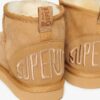Mini-Stiefel aus Wildleder und Sherpa Mini-Stiefel aus Wildleder und Sherpa