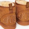Mini-Stiefel aus Wildleder und Sherpa Mini-Stiefel aus Wildleder und Sherpa