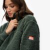 Superweiches Teddy-Fleece mit Druckknopfkragen Superweiches Teddy-Fleece mit Druckknopfkragen