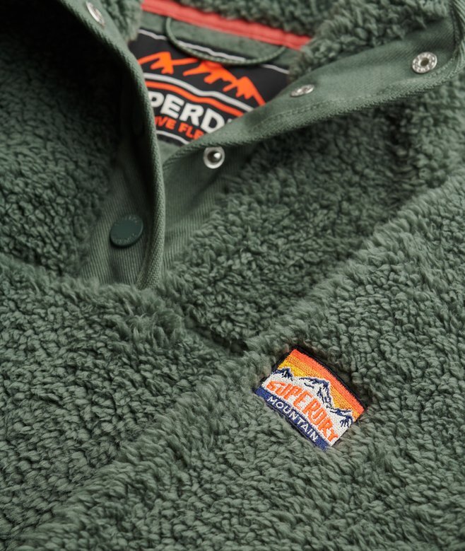Superweiches Teddy-Fleece mit Druckknopfkragen Superweiches Teddy-Fleece mit Druckknopfkragen
