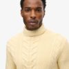 The Merchant Store – Rollkragenpullover mit Zopfmuster The Merchant Store – Rollkragenpullover mit Zopfmuster